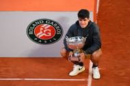 Carlos Alcaraz celebrates after winning the 2024 French Open men's singles title